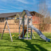 Jack and June Haven 2 Outdoor wooden playset with swing and slide, climbing ramp with rope and undercover landing. View of right front playset in the garden