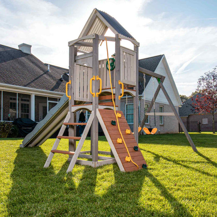 Jack and June Haven 2 Outdoor wooden playset with swing and slide, climbing ramp with rope and undercover landing. View of the steps and climbing ladder and covered landing